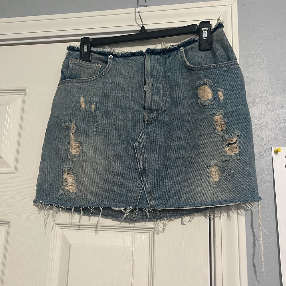 Distressed denim skirt